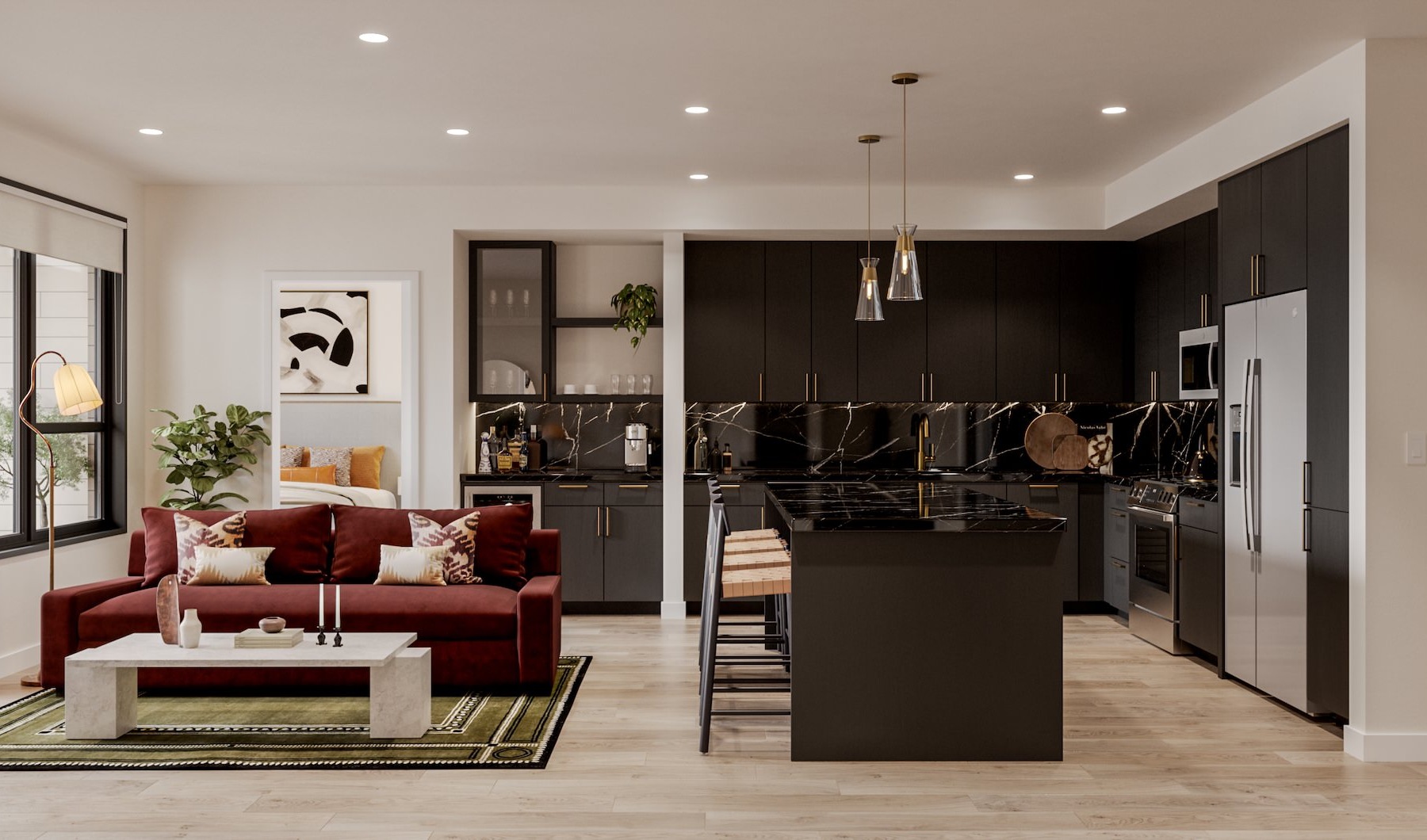 a kitchen with an island and a living room with a couch