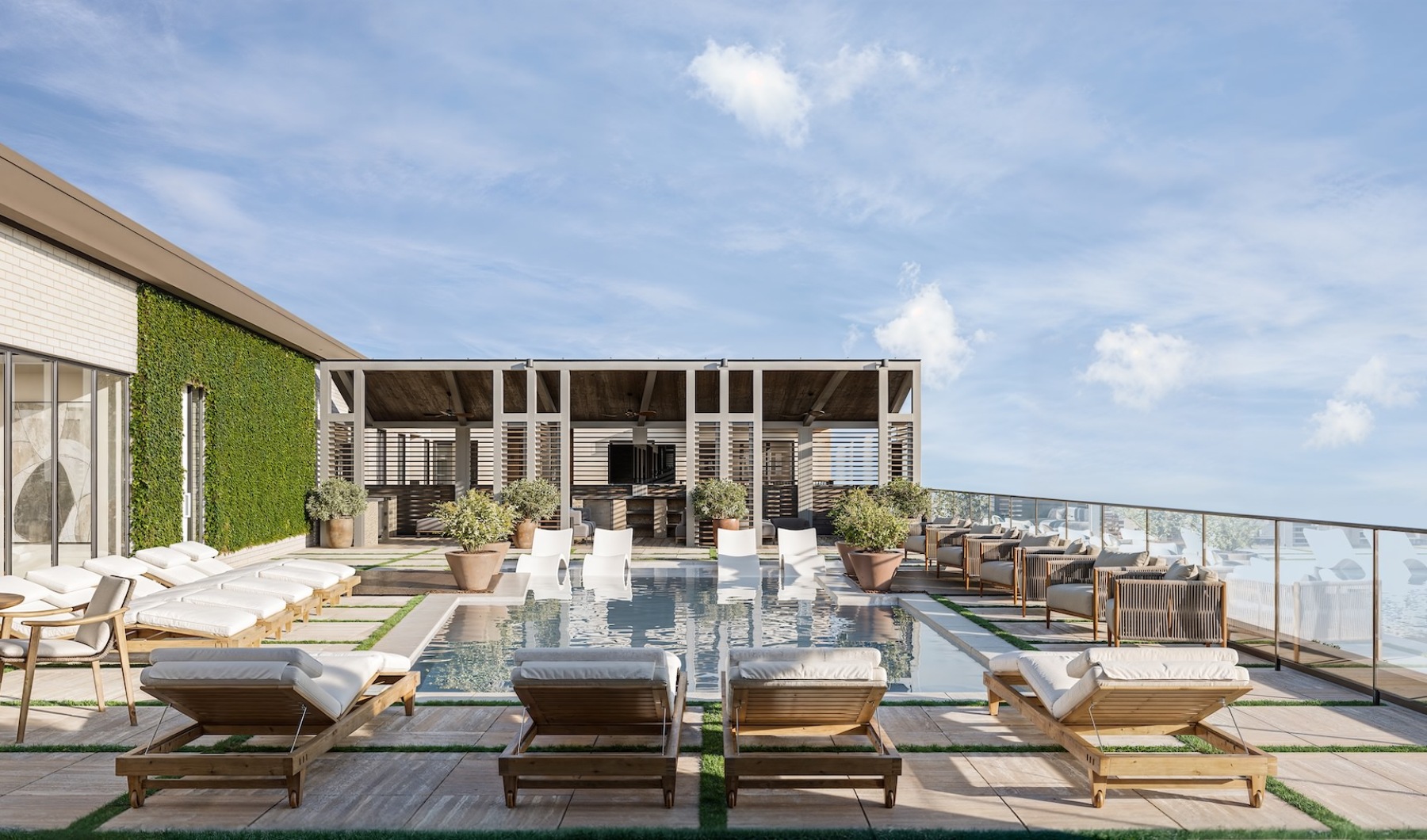 a pool with lounge chairs